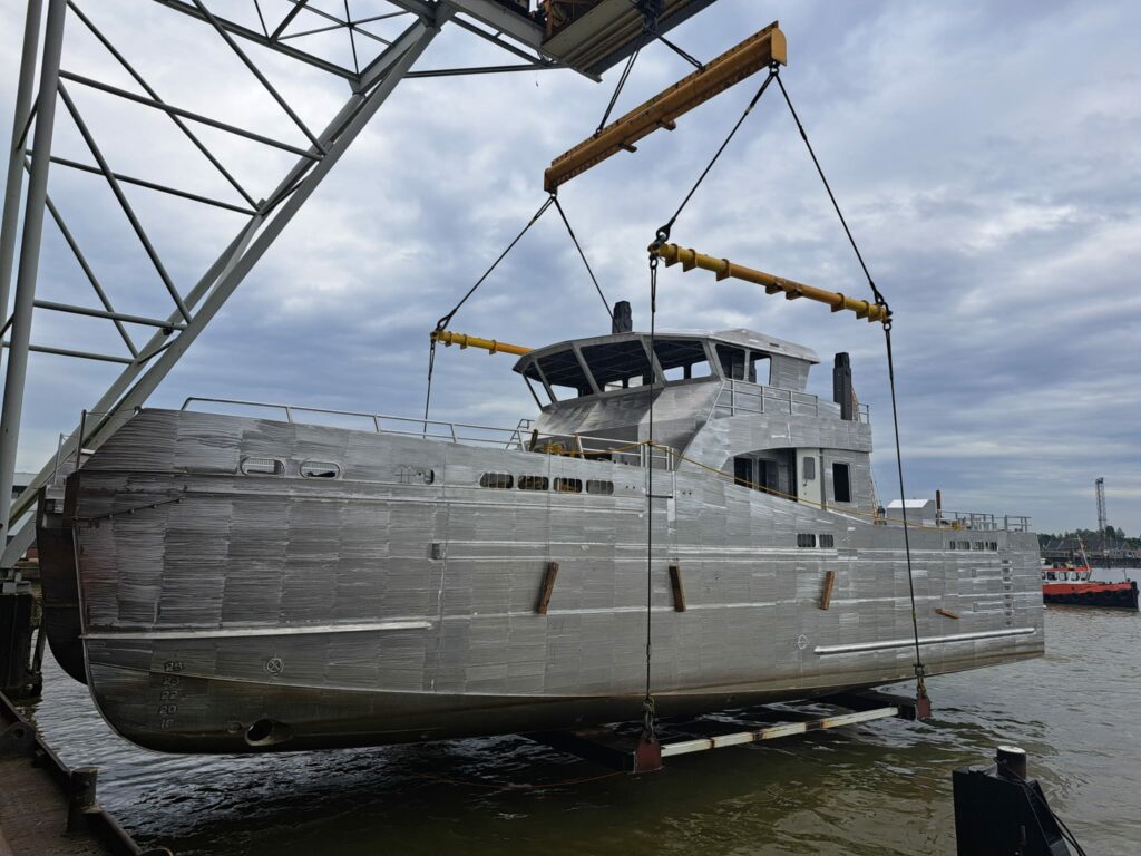 Crane lifting a boat out of the water